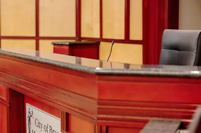 view of the judge's bench inside the courtroom.