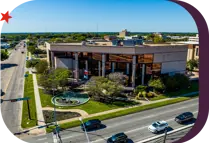 view of Bryan City Hall and the intersection of E 29th St and Texas Ave