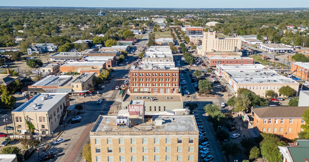 An aerial photo of Historic Downtown Bryan, overlooking the LaSalle Hotel.