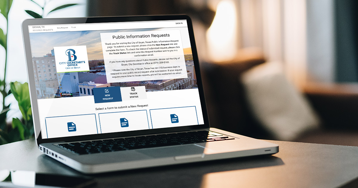 open laptop device sitting on a desk with the City of Bryan Open Records Request portal open in the browser