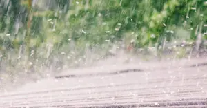 hail coming down on a rooftop.