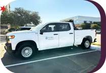 white truck with City of Bryan branding on the side