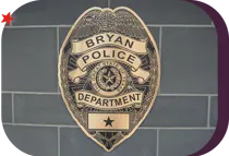 police department placard depicting a badge motif